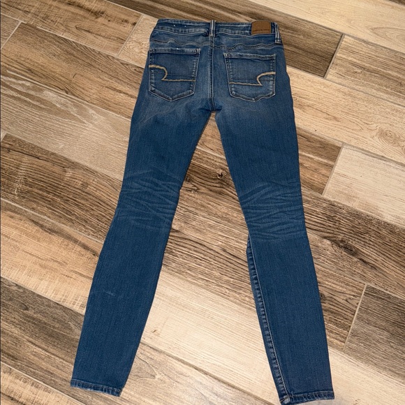 AMERICAN Eagle Sz 4 Distressed Blue Jegging EUc - Picture 2 of 3